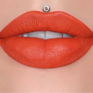 NIB Jeffree Star Pain Is Pleasure Velour Liquid Lipstick 

Vibrant bold orange